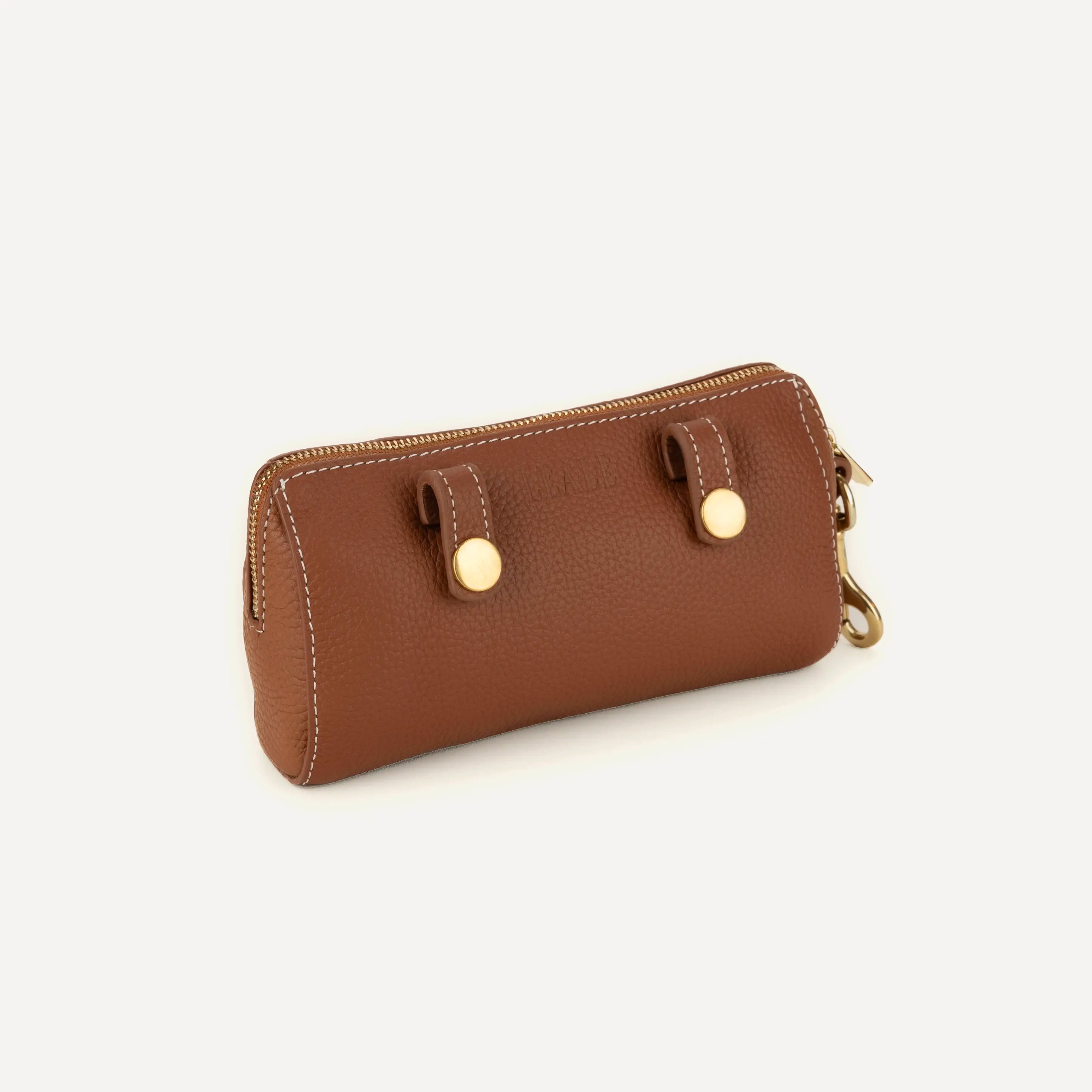 Product image of leather dog walking bag on a white background