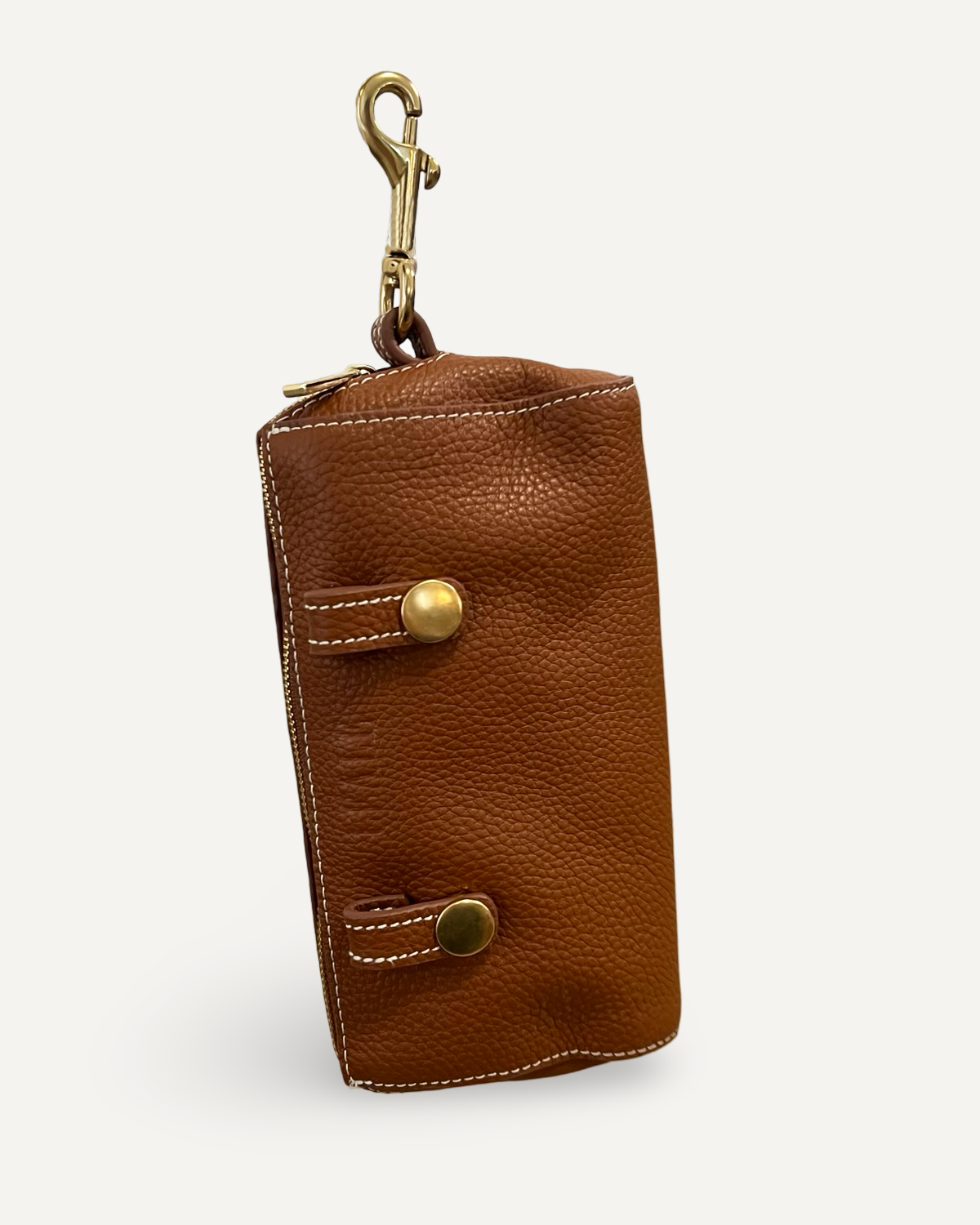 Dog walk essentials bag in brown leather with brass swivel hook, vertical picture